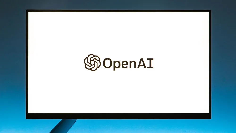 Layar monitor menampilkan logo OpenAI, platform AI yang dipakai untuk kebutuhan bisnis